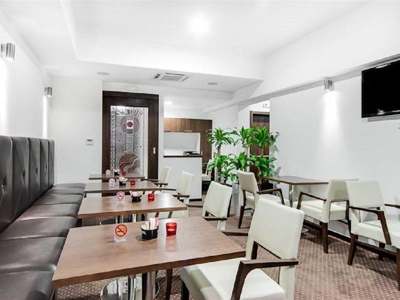 City5 Rooms & Suites By Lsa سكوبجي المطعم الصورة